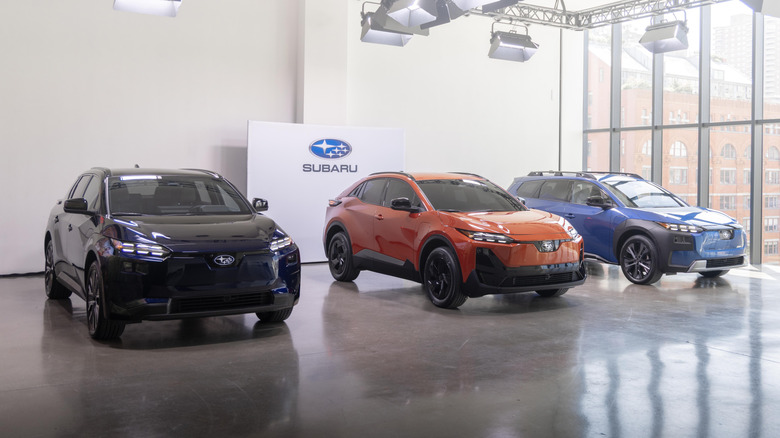 A Subaru Solterra, Uncharted and Trailseeker lined up together