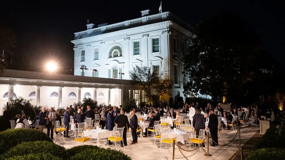 Trump hosts a dinner with members of his administration and members of Congress in the newly renovated Rose Garden at the White House on Friday. - Francis Chung/Politico/AP